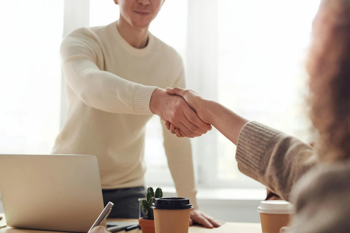Contractor shaking hands with a client