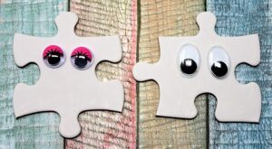 Two puzzle pieces fitting together perfectly